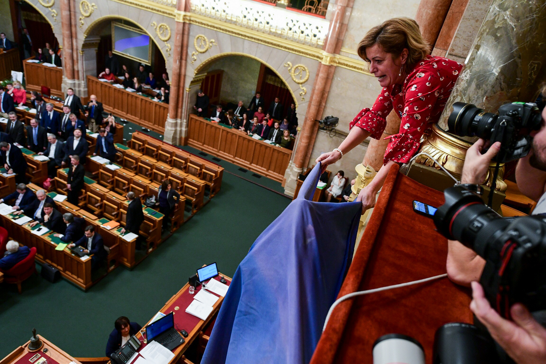 Opposition left the room, but came back for the vote on the Overtime Act - They sang the National Anthem (joined by some of the MPs of Fidesz), but the voting started - and resulted in Parliament passing the law without a problem.