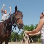 A lovakkal és a lovaglással ismertetik meg az állami gondozott gyerekeket a nyolcadik alkalommal megrendezett Ágota táborban 2004. július 23-án