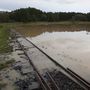 A megáradt Alsó-Válicka patak miatt víz alatt álló vasúti sín a Zala megyei Bánokszentgyörgyön.