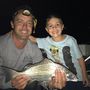 Andre fia és unokája a napi horgászat egyik kapásával.