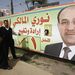 A miniszterelnök, Nuri al-Maliki óriásplakátja Bagdadban.