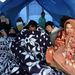 Líbiából elmenekült vietnámi vendégmunkások zsúfolódnak össze egy sátorban az ENSZ Menekültügyi Főbiztosságának, az UNHCR-nek a táborában, a tunéziai-líbiai határ tunéziai oldalán fekvő Rász Dzsdirtól több kilométernyire