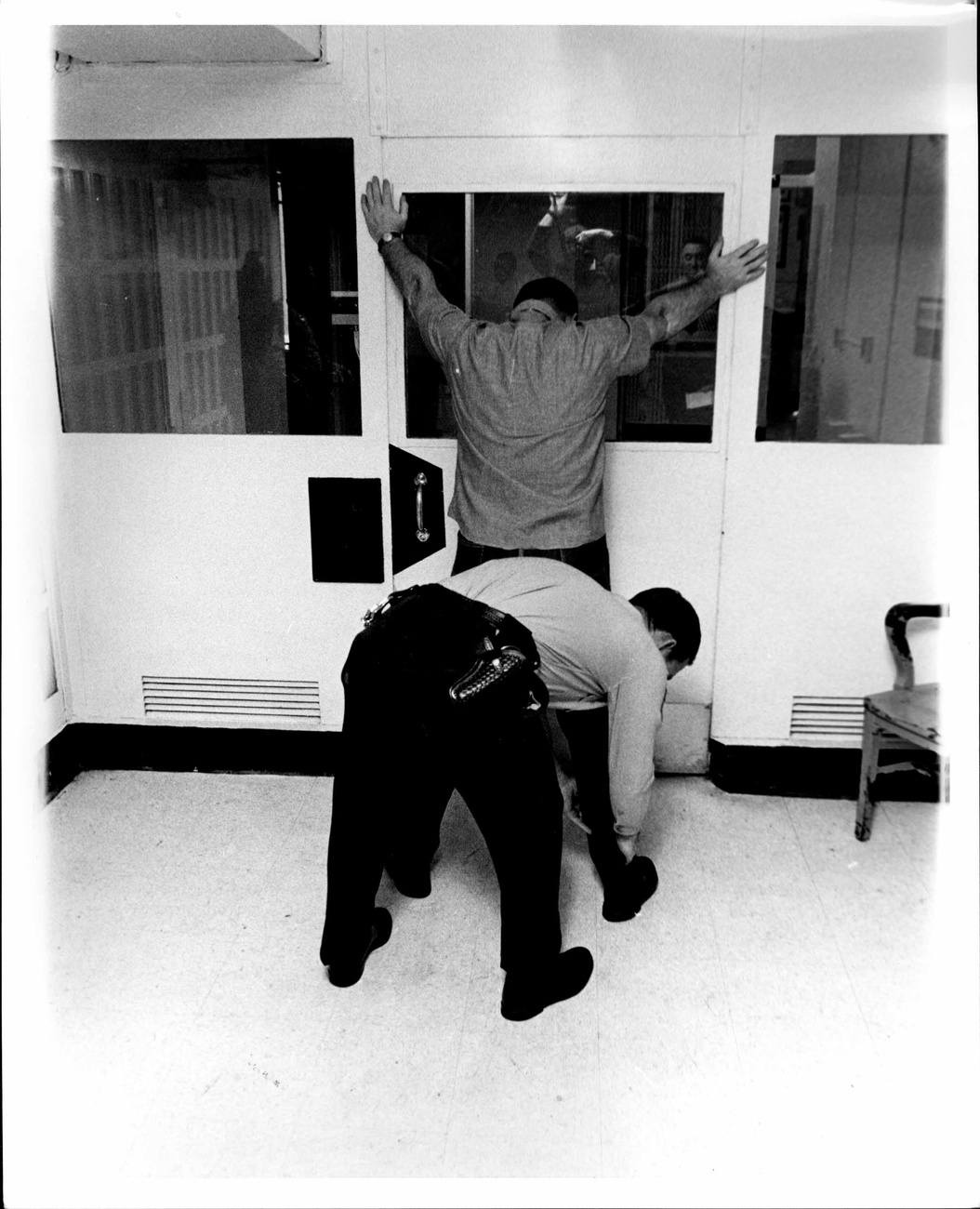 Ray letartóztatási fotója.