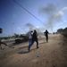 Líbiai felkelők tűzharcban Kadhafi gárdájával