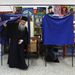 Egy görög ortodox pap hagyja el a szavazófülkét. A görög választók másfél hónapon belül másodszorra fáradtak tegnap az urnákhoz, mivel az előző választások után a pártoknak nem sikerült megegyezniük a kormányalakításban.