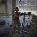 Fegyveres felkelő egy aleppói ellenőrzőponton