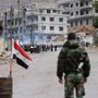 A szíriai hadsereg ellenőrzőpontja a város előtt. 