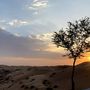 Naplemente a The Ritz-Carlton Al Wadi Desert-ben. 