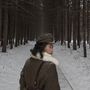 David Guttenfelder egyik kísérője, egy Észak-koreai katona sétál a fák között abban az erdőben, ahol a legendák szerint Kim Ir Szen éjszakázott, miközben személyesen vezette a koreai seregeket a japánok ellen 