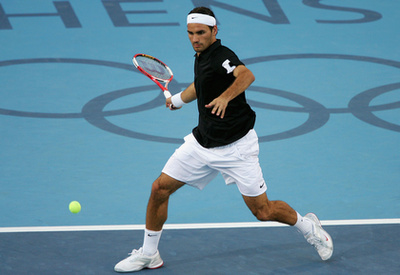 A svájci Roger Federer győzelmét ünnepli,  Lleyton Hewitt ellen 2004. szeptember 12-én a US Openen