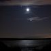 Ábrahám Tamás felvétele egy Biatorbágy melletti halastónál készült. A Hold közelében látható vonal a Nemzetközi Űrállomás nyoma.